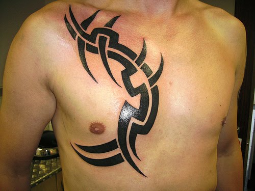 Tribal chest tattoo for men.