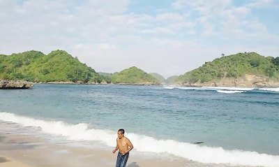 wisata pantai teluk asmoro