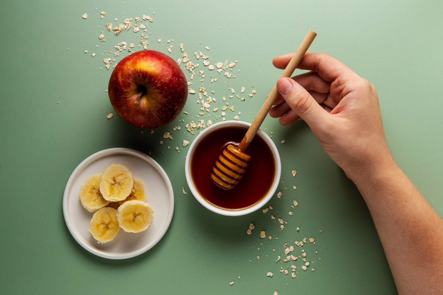apple and honey and peeled banana image