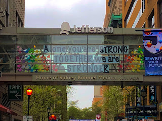 The bridge of Jefferson Hospital which reads, "Alone we are strong. Together we are stronger."