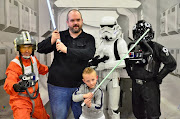 They always get their picture taken with the Star Wars characters when they .