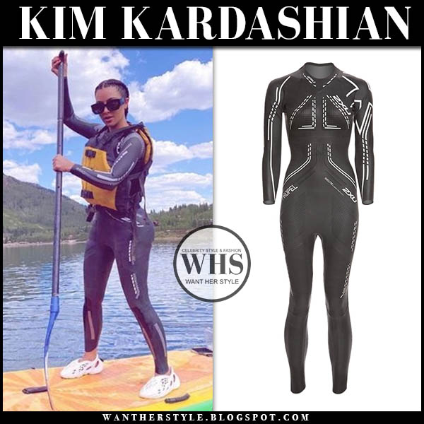 Kim Kardashian wearing black wetsuit