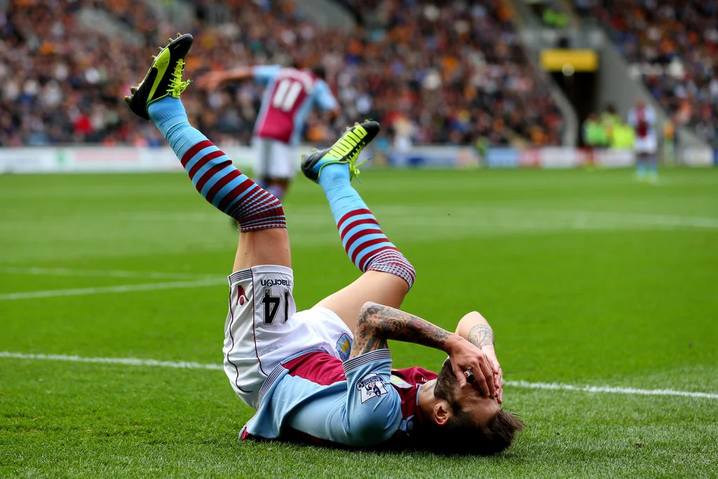 Antonio Luna of Aston Villa reacts after a missed chance on goal during the Barclays Premier League match between Hull City and Aston Villa at KC Stadium on October 5, 2013 in Hull, England