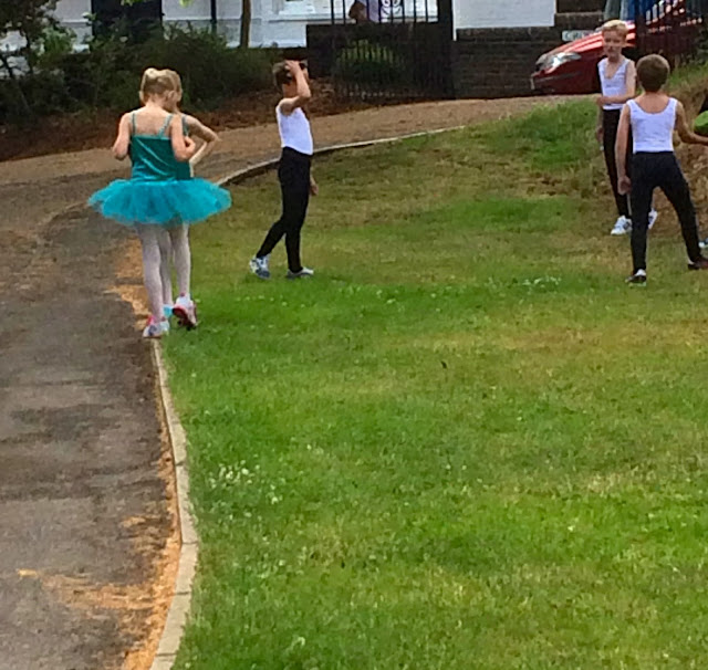 young ballet dancers playing dodgeball