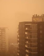 This photo taken in Beijing, China shows a dust storm darkening the sky. Dust storms are common in China and can cause significant health problems as well as economic losses. Dust storms are caused by a combination of factors, including drought, land degradation and climate change.