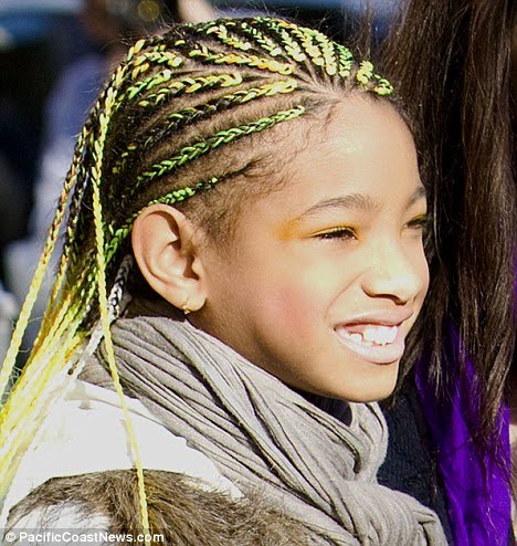  steps up her style game as she reveals new waistlength neon hair braids
