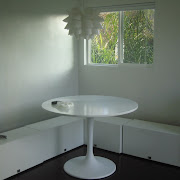 Make a compact banquette from kitchen cabinets