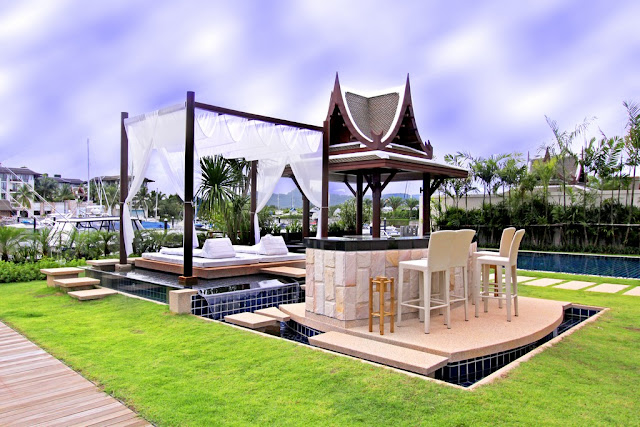 Picture of the private outdoor bar and bed above the pool in the backyard 