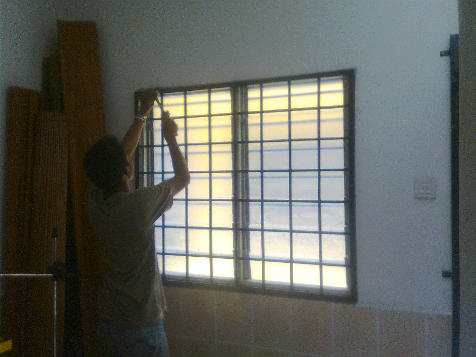 construction installation of window grills  pemasangan 