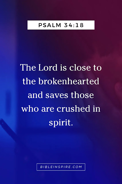 Psalm 34:18, a tender bible verse to encourage a friend, assuring that 'The Lord is close to the brokenhearted' and saves the crushed in spirit, set against a blurred background with a person looking at a phone, conveying a moment of reflection or need for comfort.