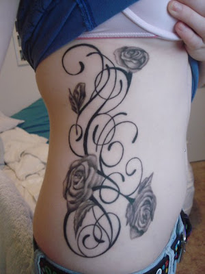 by tatkobarba on Nov22 2009 under black roses body woman tattoos