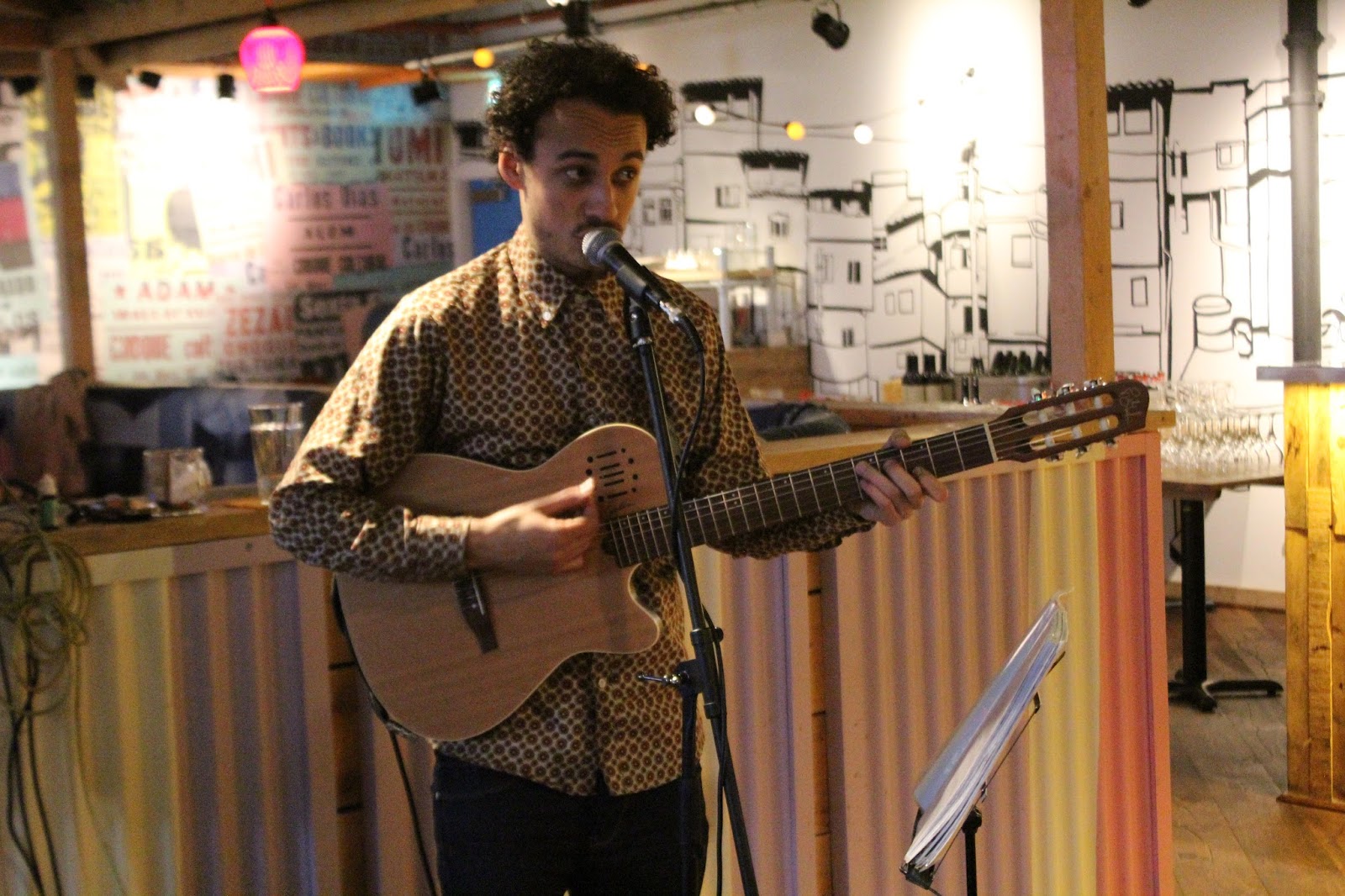 Singer with accoustic guitar at Cabana