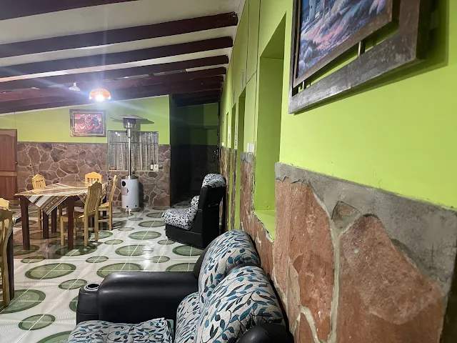 Dining area with the Hostel Rooms around, Latitudes Hostal, Huyajara, Laguna Colorada, Bolivia