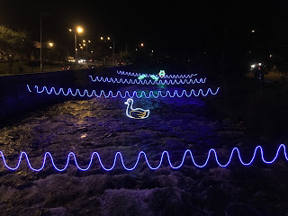 Christmas lights over the Rio Tomebamba, Cuenca, Ecuador