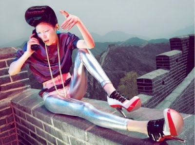 High Fashion Magazines on Woman With Crazy Silver Pants Wacky Shoes Sky High Hair Talking On