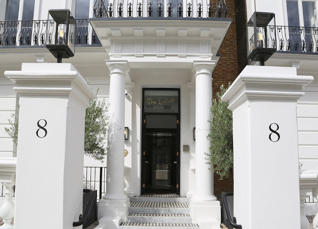 The Laslett Hotel white exterior entrance in Notting Hill in the heart of West London