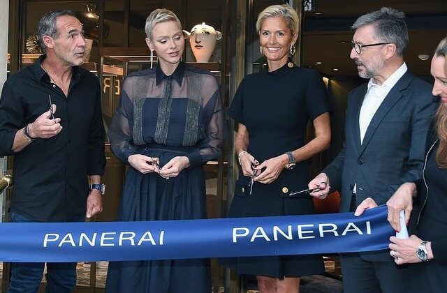 Princess Charlene wore a new Monili stripe semi sheer blouse by Brunello Cucinelli, and navy blue maxi skirt by Akris