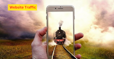 website traffic ,is truely challenge task,train appears in mobile window ,holding by the guy ,explains