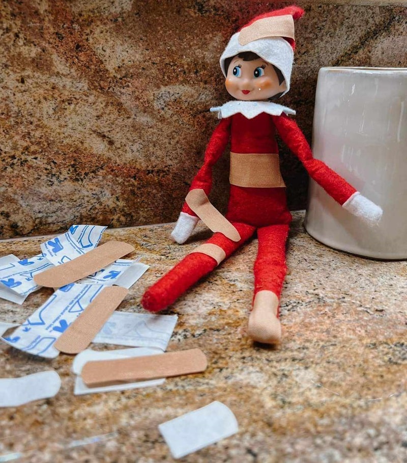 elf covered in bandaids.
