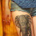 Trendy Thigh Of Women With Elephant Tattoo