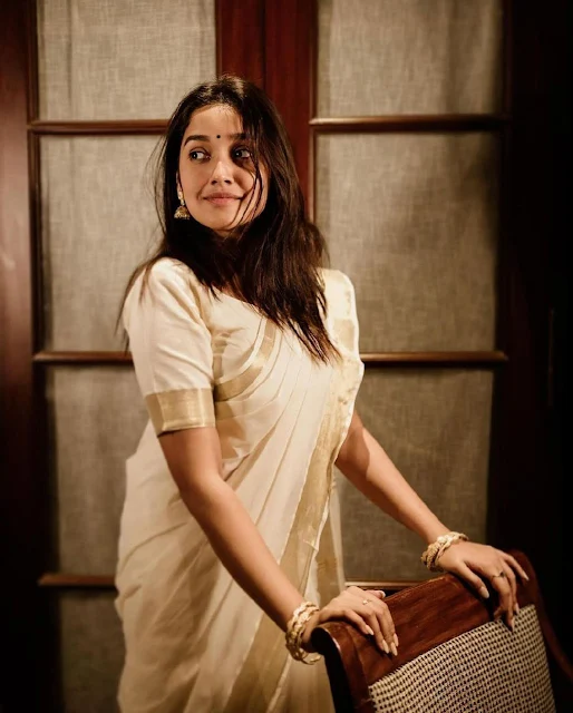 Anikha Surendran in a delicate cotton saree