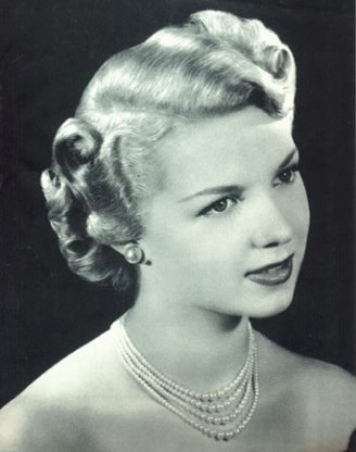 hayworth 1940s hairstyle. Victory Rolls. You know, in case I wanted to go as