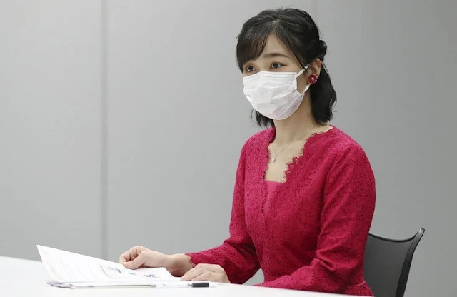 Princess Kako wore a red lace midi dress and red top. Red flower and pearl earrings