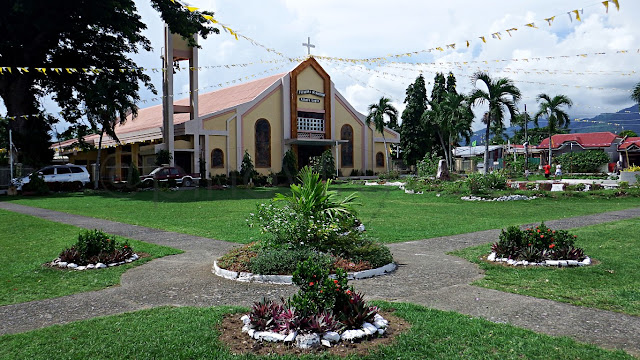 view of the garden and building of St. James Parish Church of Albuera Leyte
