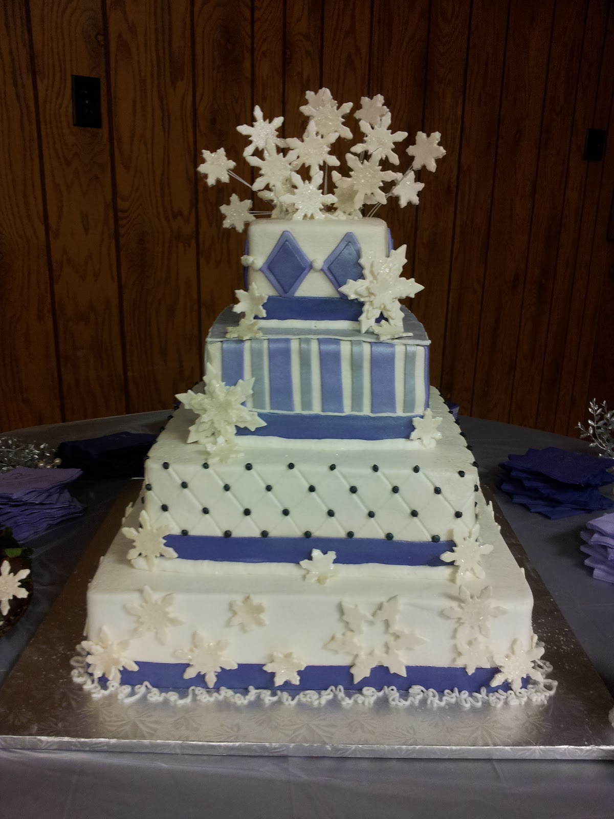 silver wedding cake stands , white and silver wedding cake with fondant snowflakes. This cake 