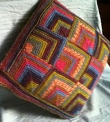 http://www.ravelry.com/patterns/library/colourful-cushion-cover