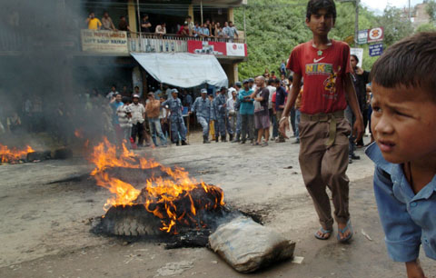 Nepalese people block the 2011