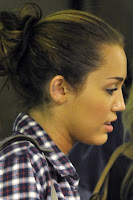 miley-ear-tattoo-05.jpg