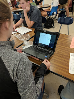 A Jefferson high school student opens her Chrome book for the first time.