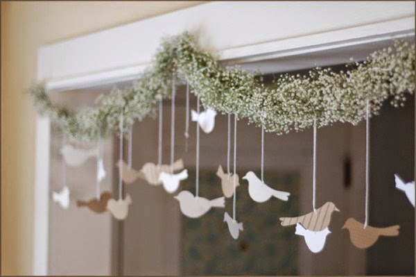 http://makezine.com/craft/how-to_bird_and_flower_garland/