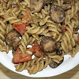 pesto cavatappi pasta Cavatappi pasta pesto spoon slotted pan using into
