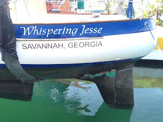 Whispering Jesse's damaged skeg comes into view