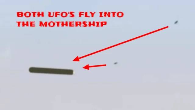 Both UFOs flying in to the Mothership UFO.