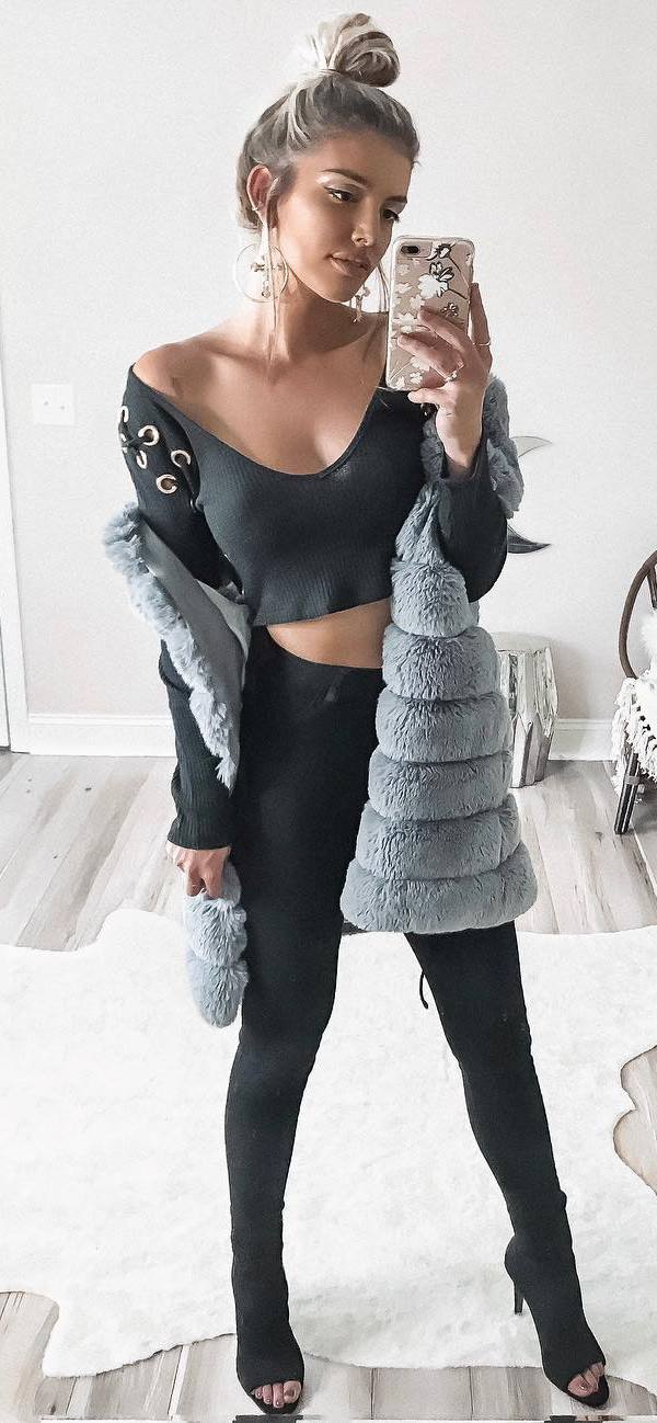 fall trends / lace up sweater + fur vest + black skinnies + boots