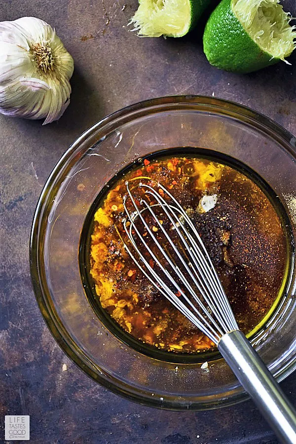 Whisking up the flank steak marinade to make cast iron flank steak