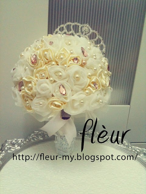 Princess Hand Bouquet by Fleur. White and Ivory and Light Pink Bouquet with Crown/Tiara.