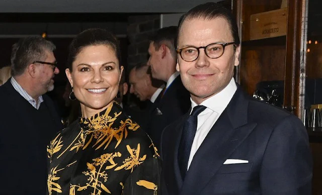 Crown Princess Victoria wore a Dora gold flower silk dress Dagmar. Gold diamond drop earrings