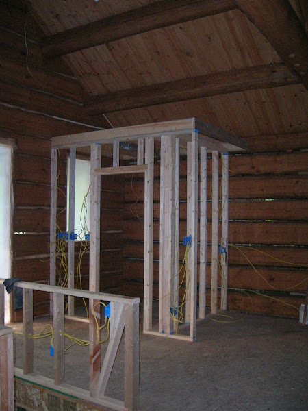 The entry bathroom is framed