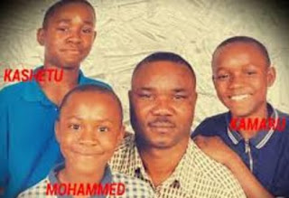 Kamaru With His Dad And Brothers