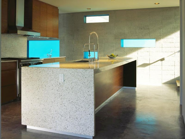 Photo of modern kitchen with the island in the middle