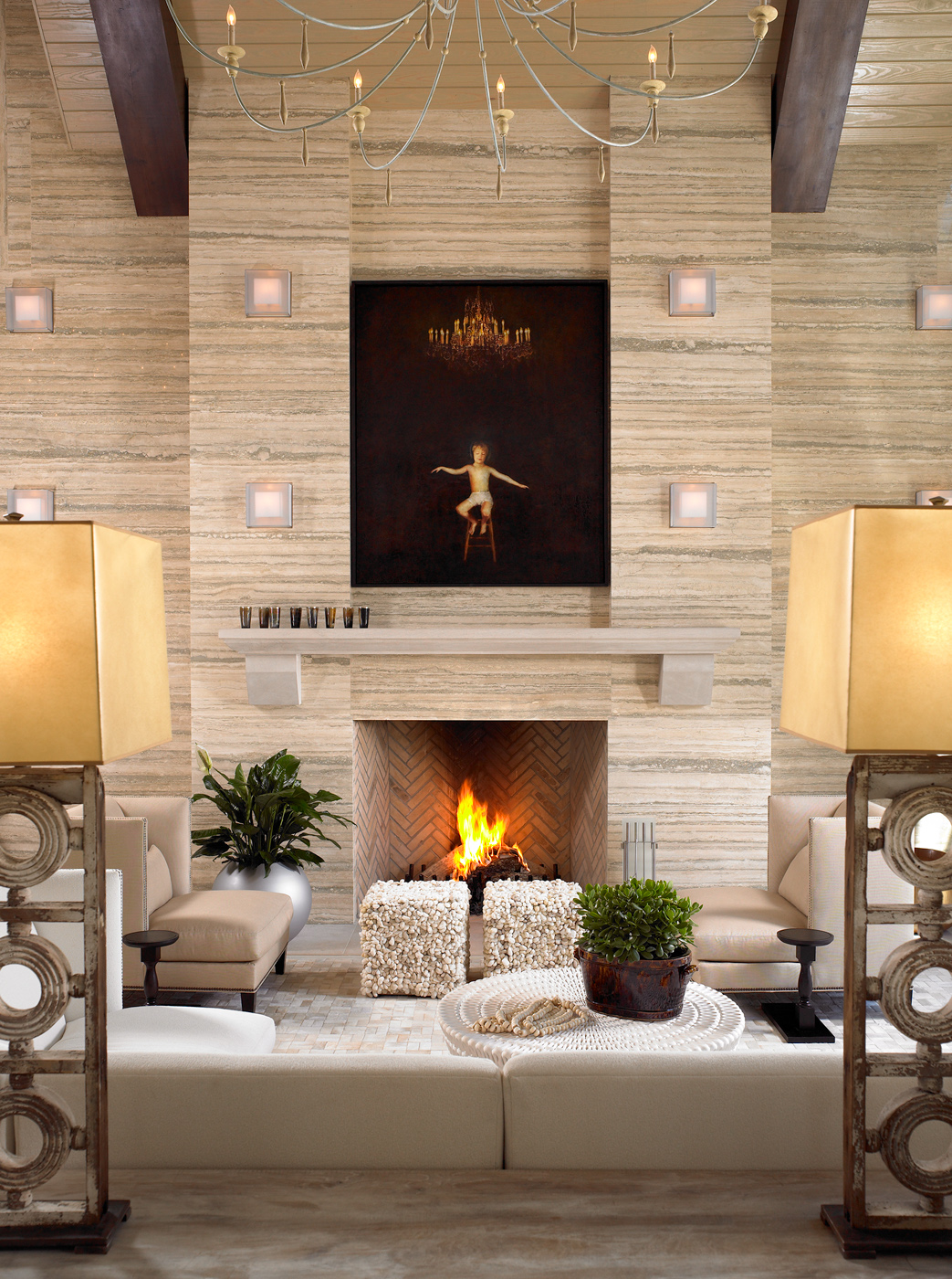 Highlighted art recessed within silver travertine solid walls title=