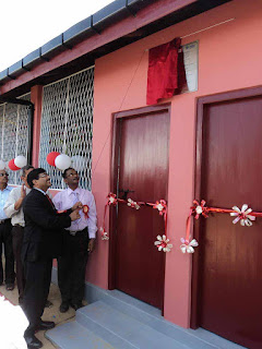 Neeraj Garg - Vice President, South West Asia & Juice Business, Coca-Cola India & South West Asia Business Unit; unveiling the commemorative plaque to open the Navalar pre school in Batticaloa