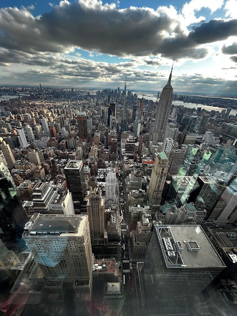 looking down on buildings in Manhattan, lots of buildings of varying heights