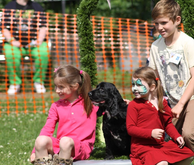 Photo of children with their pet Dog at last year's Mile End Park Dog Show