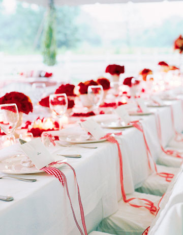 The white bowls of red flowers possibly carnations if so they're great 