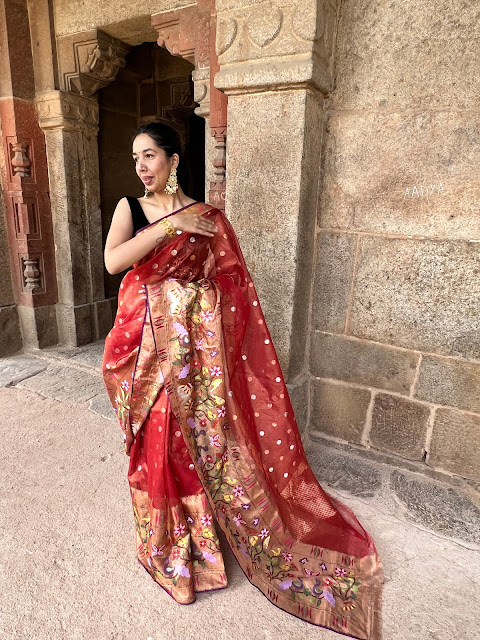 Double tissue kota doria saree with polka dots and jungle themed motifs